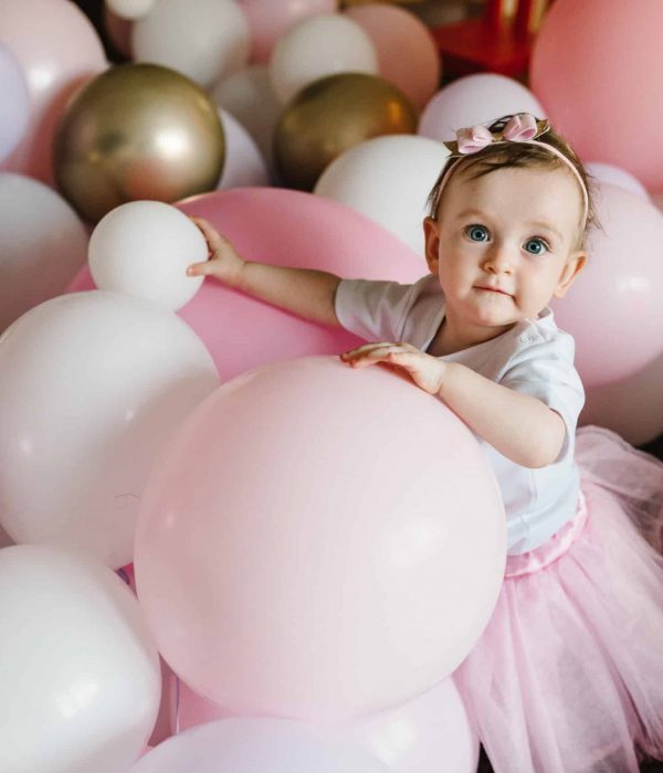 Cute,Baby,Girl,1,Year,Play,With,Colorful,Balloons,In